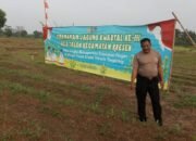 Kapolsek Kresek bersama Kelompok Tani melaksanakan perawatan Lahan yang sudah ditanami Jagung