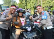 Jelang Hari Kemerdekaan, Kapolresta Tangerang Bagikan Bendera Merah Putih kepada Pengguna Jalan