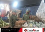 Jelang Imlek Babinsa Mantau Langsung Harga Sembako di Pasar Kukun